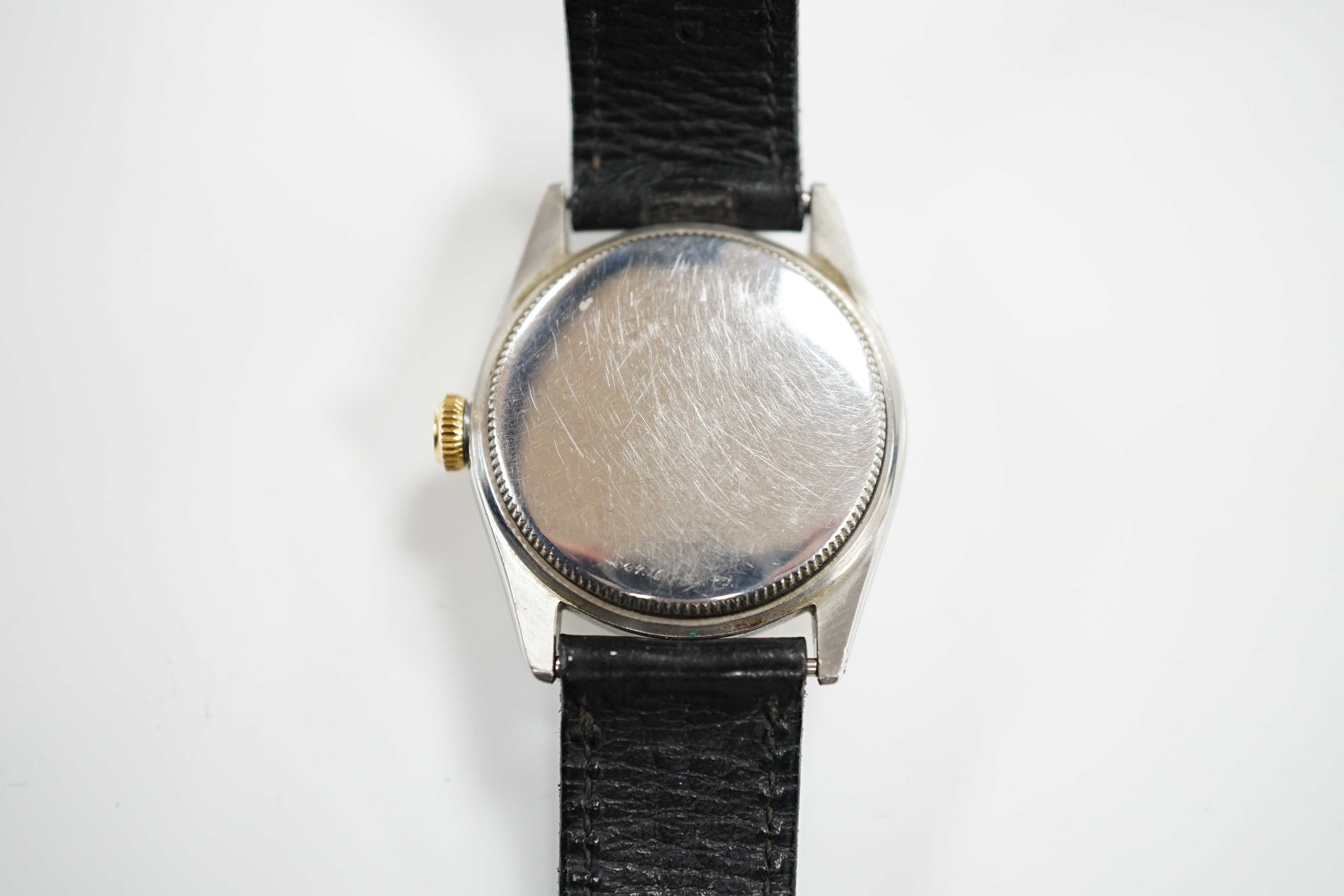 A gentleman's 1950's? steel and gold plated mid-size Rolex Oyster-Speed King Precision manual wind wrist watch, with baton numerals, model number 5021, serial number 654122, case diameter 32mm, on an associated leather s